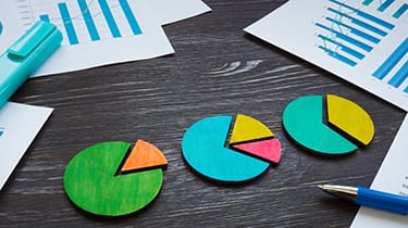 Pie,Charts,On,The,Table,As,A,Business,Or,Marketing